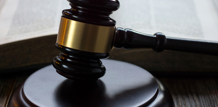 Gavel, book, and flag background