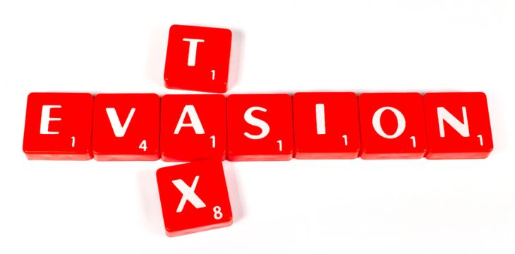 Tax Evasion red letter blocks