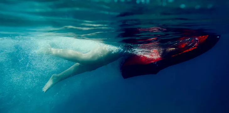 person using underwater scooter