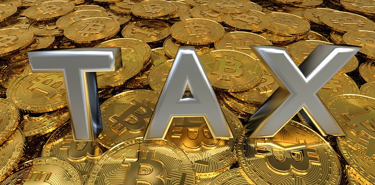 a pile of coins with the text "TAX"