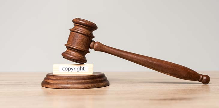 Gavel and wooden block with copyright inscript