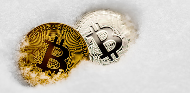 Bitcoin cryptocurrency on snow.