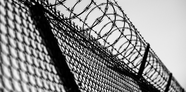 Prison Fence with barbed wire