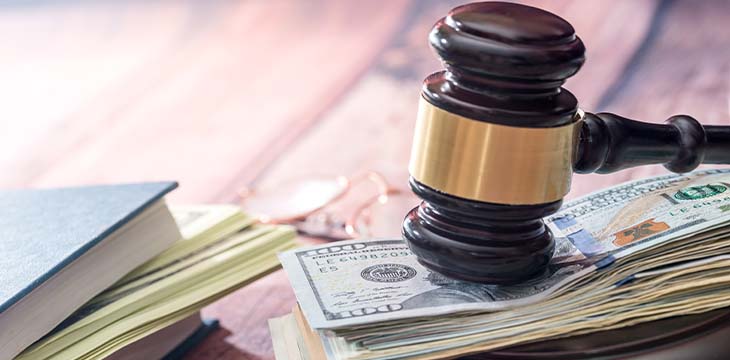 Wooden gavel with book and dollar. law concept — Photo