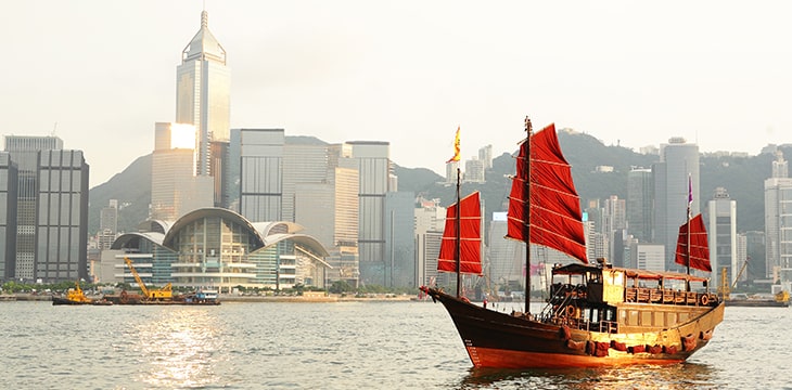 Hong Kong harbour with tourist junk