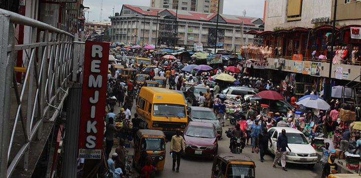 image of a businessman during a business time in Lagos busy business district Lagos Nigeria