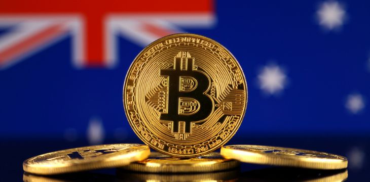 Stack of gold bitcoins with Australia flag background