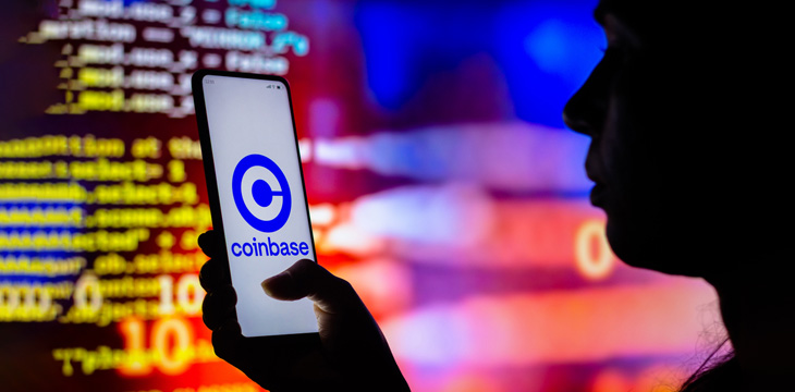 Coinbase logo displayed on a smartphone