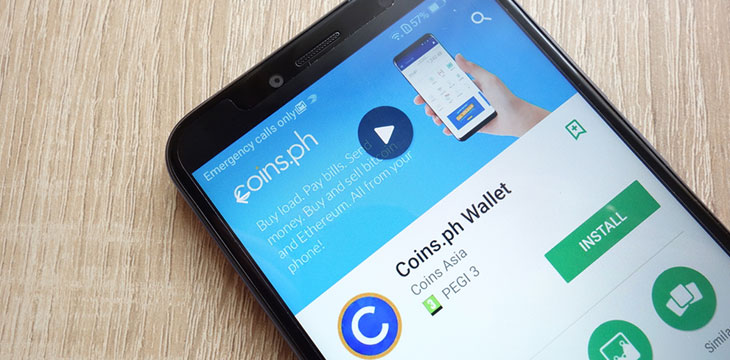 Coins.ph Wallet app on Google Play Store website displayed on Huawei Y6 2018 smartphone