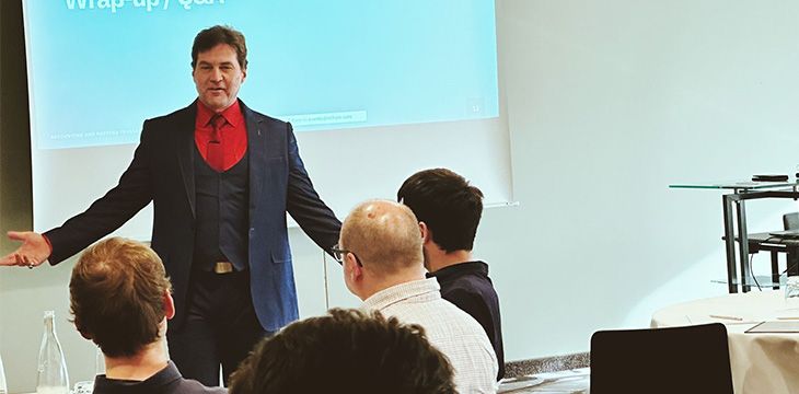 Dr. Craig Wright on the Bitcoin Masterclass speaking in front of a crowd