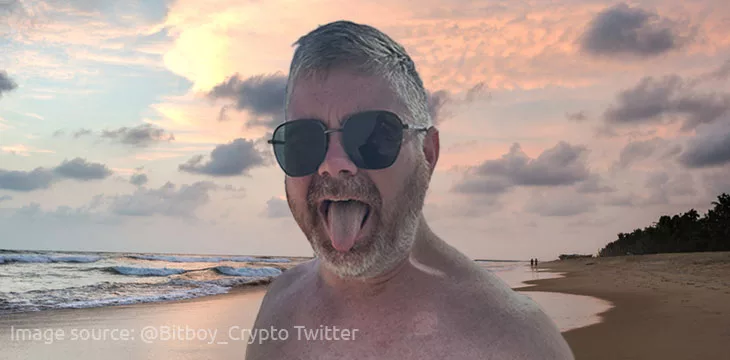 Ben Armstrong wearing sunglasses at the beach