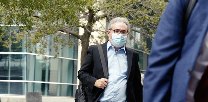 Kleiman walking with mask on