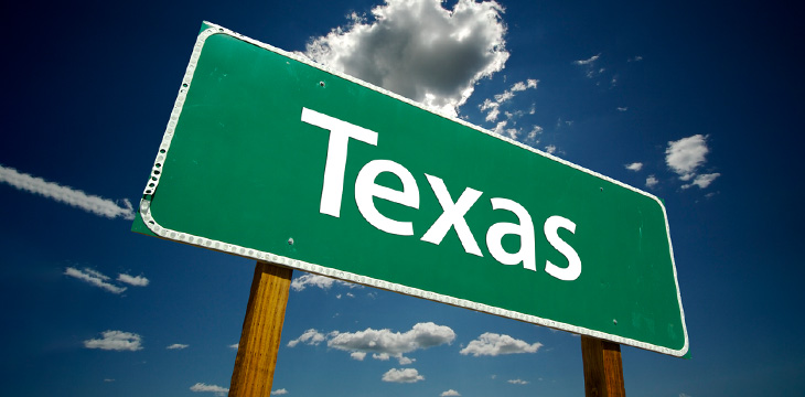 Texas Road Sign Over Sky and Clouds