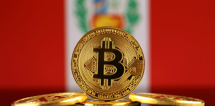 bitcoin in front of a blurred Peru flag