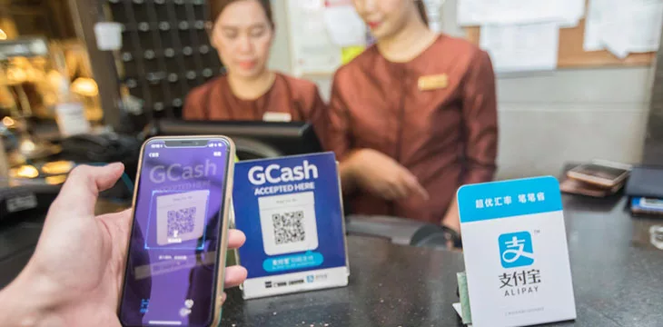 someone paying using gcash qr code