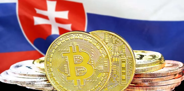 Gold Bitcoins on Slovakia flag background