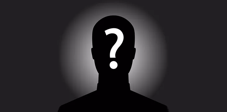 Silhouette of anonymous man with question mark