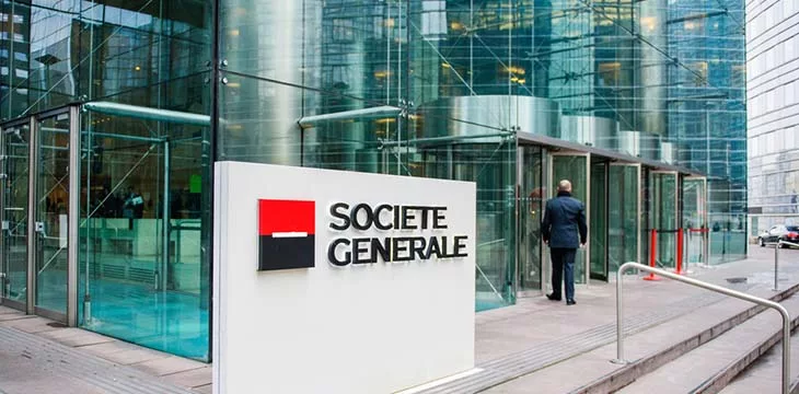 Businessman entering through the Societe Generale Headquarter entrance in La Defense