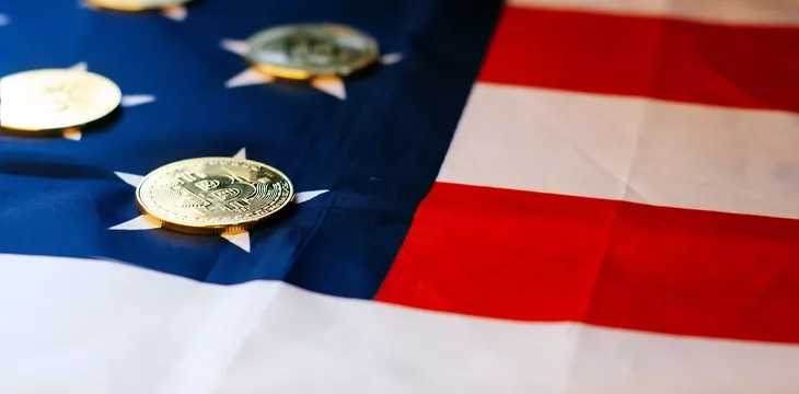 Bitcoin and us flag, gold coins