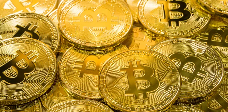 Physical Bitcoin pile background