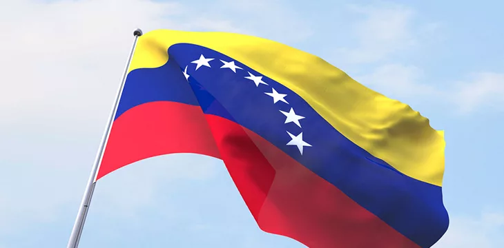 Venezuela's flag with a sky background