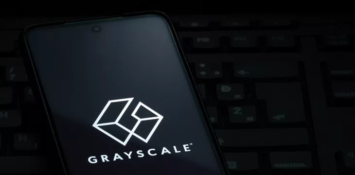 Grayscale investing logo shown on smartphone screen