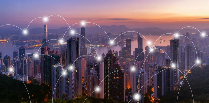 Digital network connection lines of Hong Kong Downtown. Financial district and business centers in smart city in technology concept. Skyscraper and high-rise buildings. Aerial view