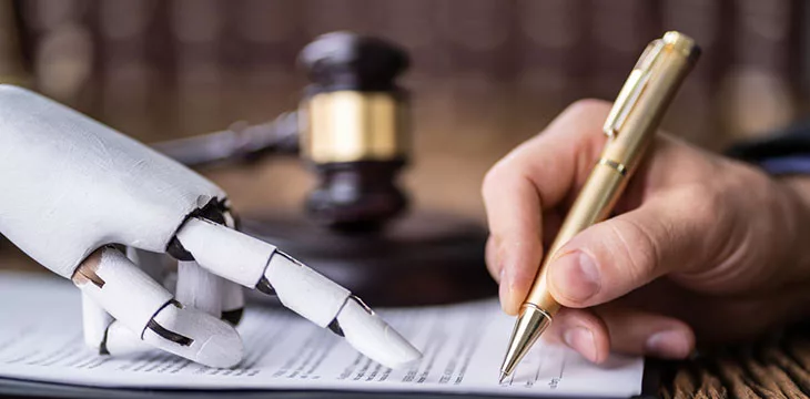 robotic hand assisting person in signing a contract