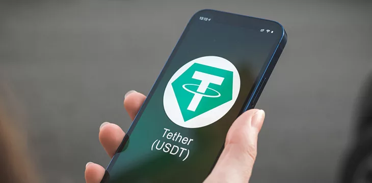 Tether logo on phone screen