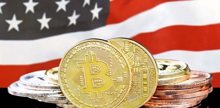 Bitcoins on American flag background