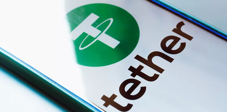 Tether logo displayed on modern smartphone screen