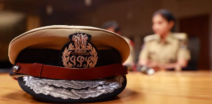 police hat and indian police woman