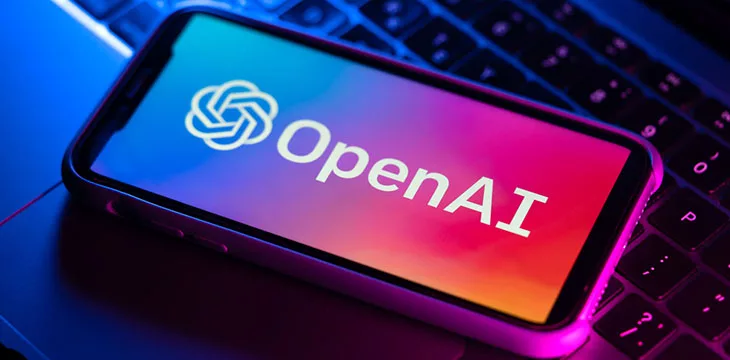 OpenAI logo on a phone screen