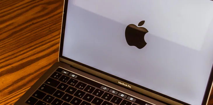 Laptop and Apple logo