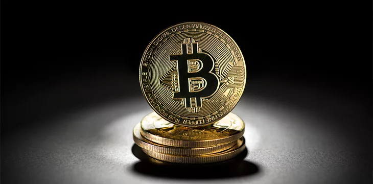 Bitcoin gold coin in black background