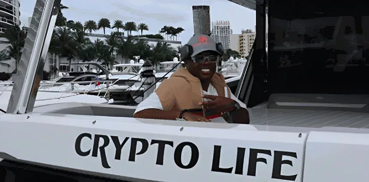 BitcoinRodney on a boat saying "crypto life"