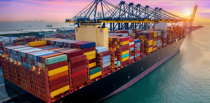 cargo ship and cargo container in harbor