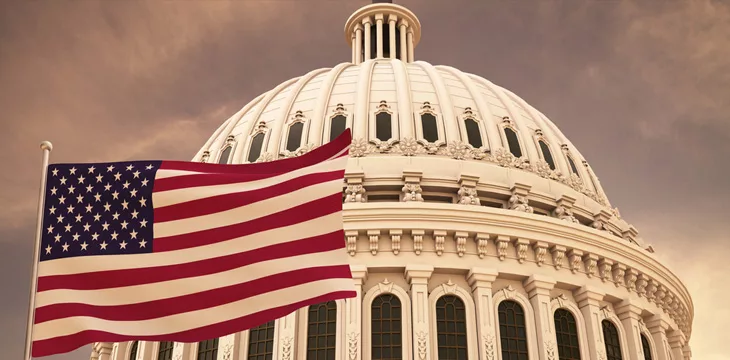 American flag waving with the US Capitol Hill