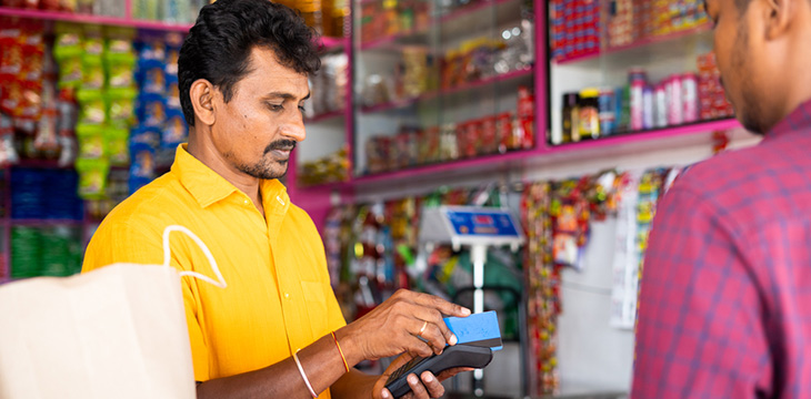 Man paying using credit card