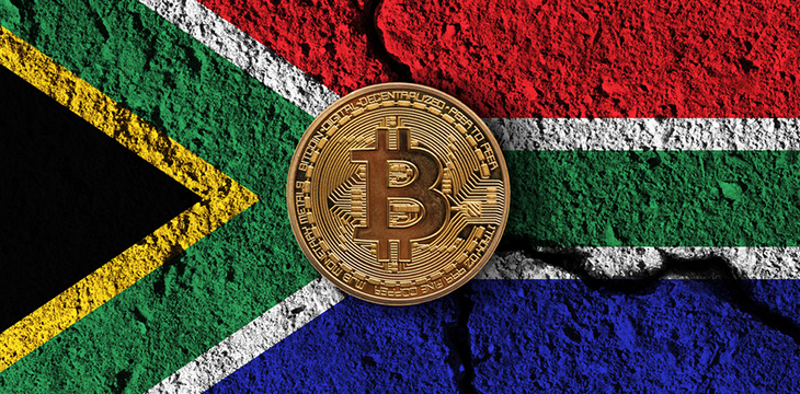 Digital currency coin with cracked South Africa flag