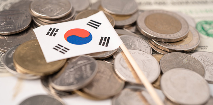 Stack of coins with South Korea flag